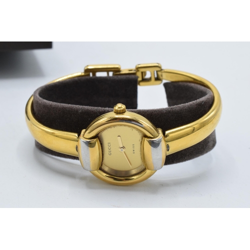 227 - Boxed Gucci gold-plated stainless steel lady's bangle watch 1400L, 26mm without bezel, untested.