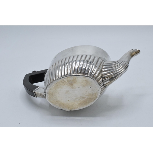 237 - Silver teapot with ebonised handle, engraving to one side. Hallmarks slightly rubbed 1899, Chester 2... 