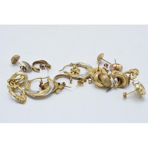 239 - A collection of 9ct gold earrings, 12.5 grams.