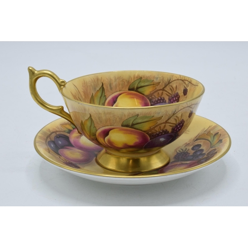 39 - Aynsley Orchard Gold cup and saucer both signed by N Brunt (2).