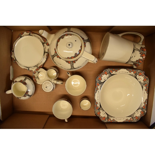 64 - A good collection of Crown Ducal tea and dinner ware in the Orange Tree design to include a teapot, ... 