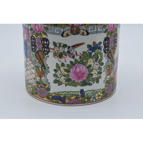 72 - A 20th century Chinese enamelled decoration lidded barrel jar, 6 character mark to base, 16cm tall.