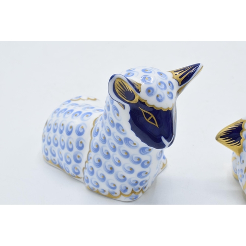 82 - Boxed Royal Crown Derby paperweights Twin Lambs and a Lamb , first quality with gold stoppers.