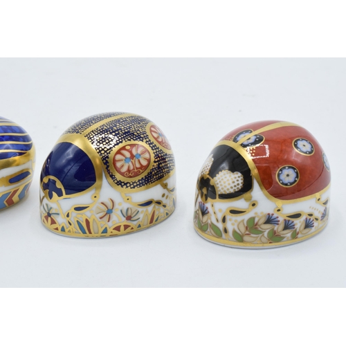 83 - Boxed Royal Crown Derby paperweights Millennium Bug, Blue Ladybird with 4 spots and a Red Ladybird w... 
