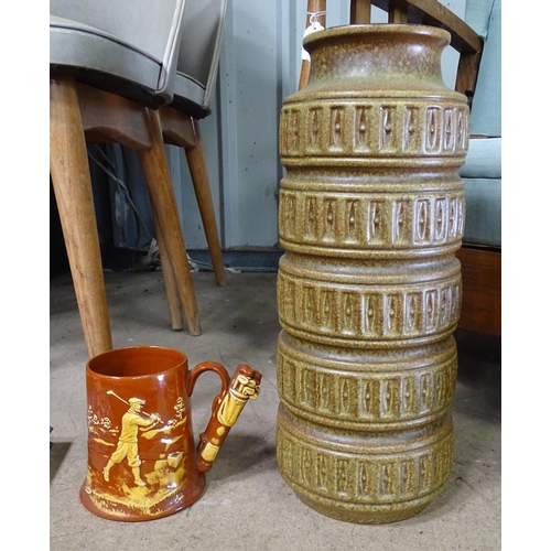 A Tall West German Vase Together With A Dartmouth Pottery Golfing