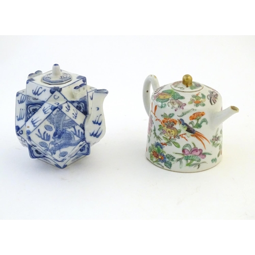 34 - Two Chinese teapots comprising a blue and white example with a geometric body decorated with stylise... 