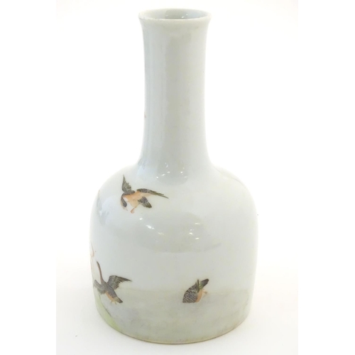 26 - A Chinese bottle vase decorated with a landscape scene with ducks / birds. Character marks under. Ap... 