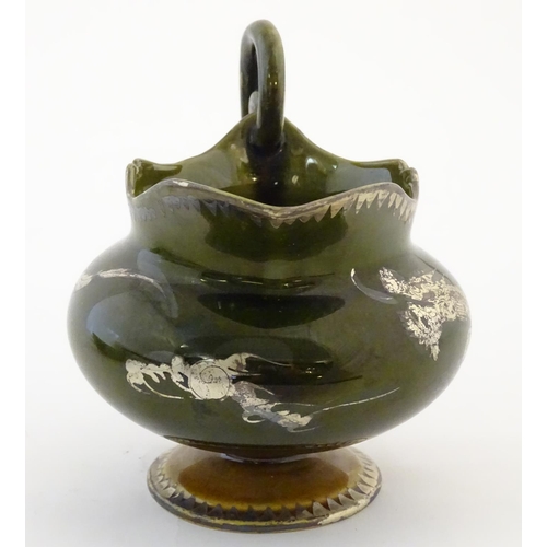 50 - An Oriental pedestal cream jug with gilt dragon detail. Impressed marks under. Approx. 4