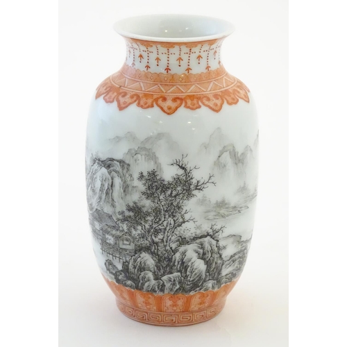 55 - A Chinese small vase with monochrome mountainous landscape detail and orange banded borders. Approx.... 