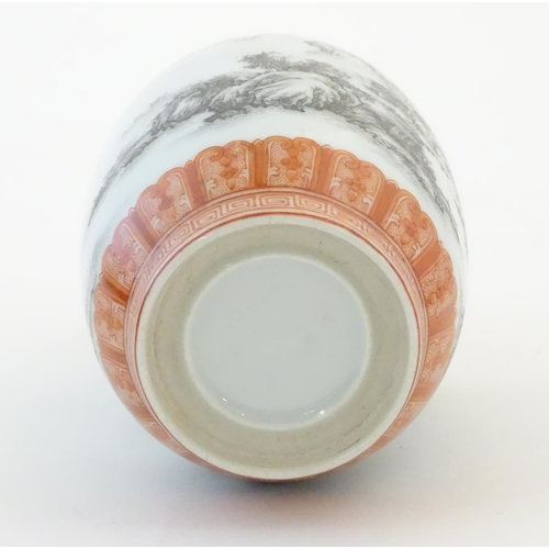 55 - A Chinese small vase with monochrome mountainous landscape detail and orange banded borders. Approx.... 