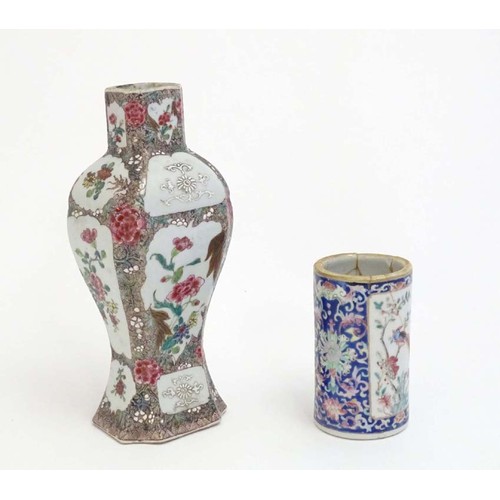 43 - A Chinese vase with panelled peony and flower decoration. Together with a Chinese brush pot of cylin... 