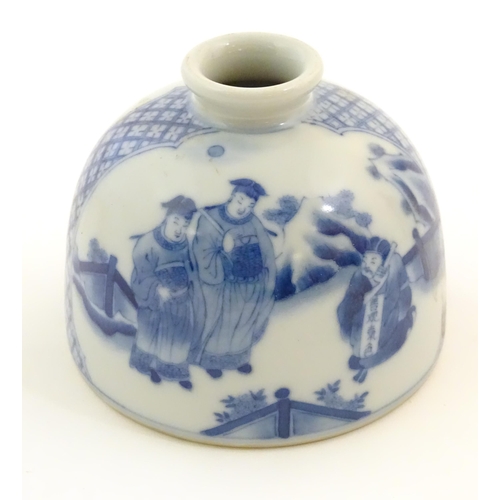 49 - A Chinese blue and white ink pot of dome form decorated with scholars with scrolls in a landscape. C... 