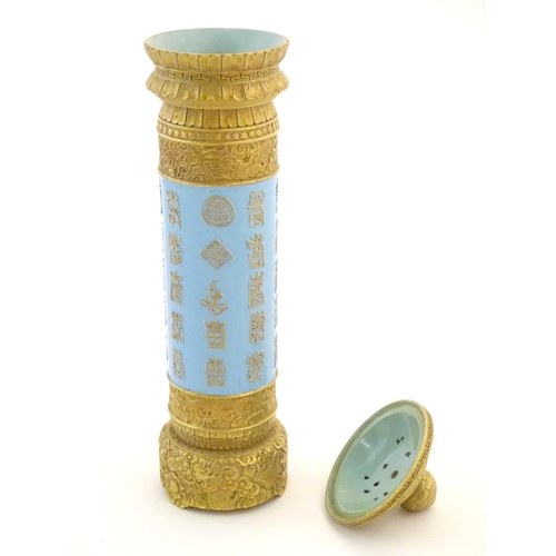 51 - A Chinese incense burner / stick holder / stand of cylindrical form. Decorated with Oriental script ... 