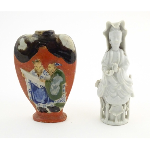10 - A Japanese small Sumida Gawa vase with figural detail in relief. Character marks under. Approx. 5
