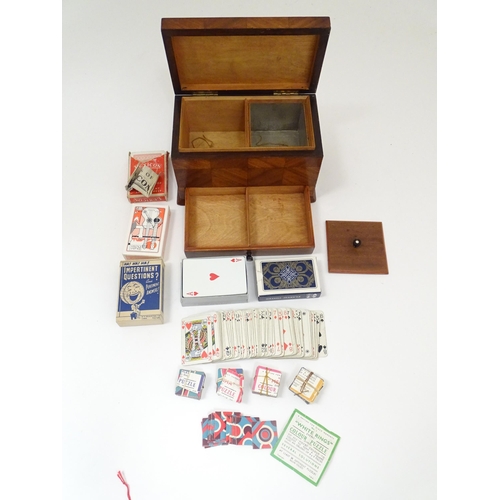 1294 - An early 20thC games compendium / box, the exterior with chequered mahogany panelling, fitted sectio... 