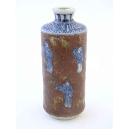 14 - A Chinese snuff bottle with blue and white figures and a mottled ground. Character marks under. Appr... 