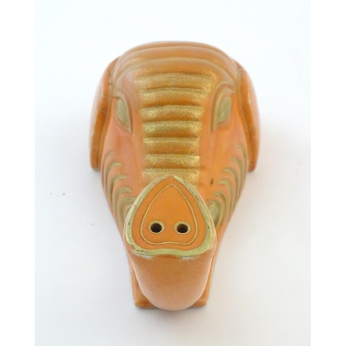 8 - A Chinese wall pocket formed as the head of an elephant, with gilt highlights. Approx. 7 1/4