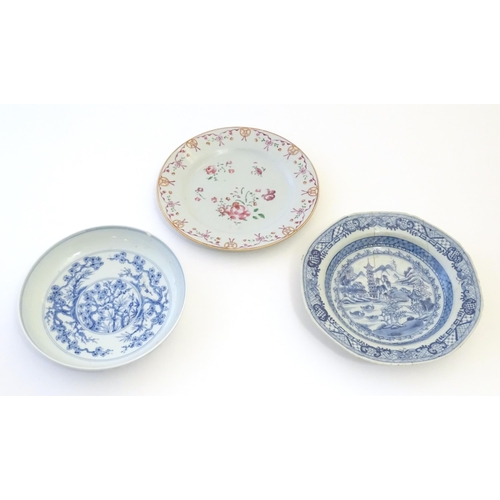 43 - Two Chinese blue and white dishes, one decorated with a river landscape depicting boats, pagoda styl... 