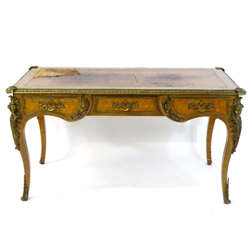 1955 - A C.1910 Louis XV style rosewood veneered bureau plat by Danish maker 'Lysberg and Hansen'. Having a... 