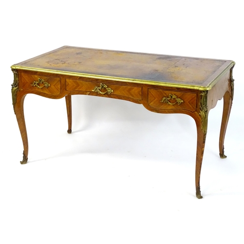1956 - A C.1900 Louis XV style rosewood and tulipwood veneered bureau plat by Mercier Frères, This exceptio... 