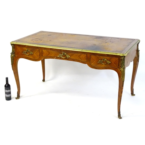 1956 - A C.1900 Louis XV style rosewood and tulipwood veneered bureau plat by Mercier Frères, This exceptio... 
