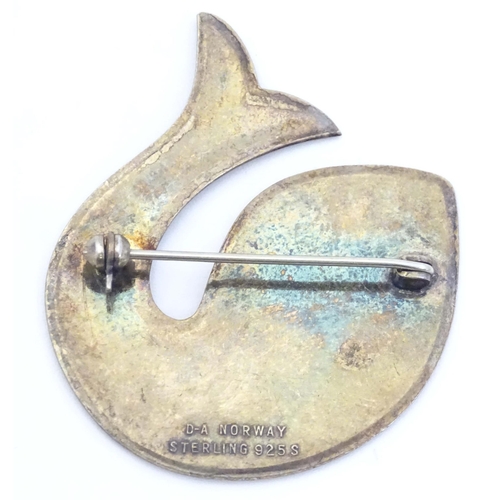 674 - Scandinavian Jewellery: A Norwegian silver gilt brooch formed as a stylised fish with enamel decorat... 