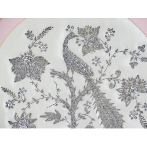 1936 - An early 20thC wirework embroidery depicting a stylised peacock bird in a tree with flowers and foli... 