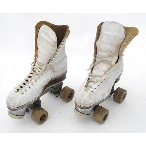 17 - A pair of mid 20thC roller skates, maker under Ace 6