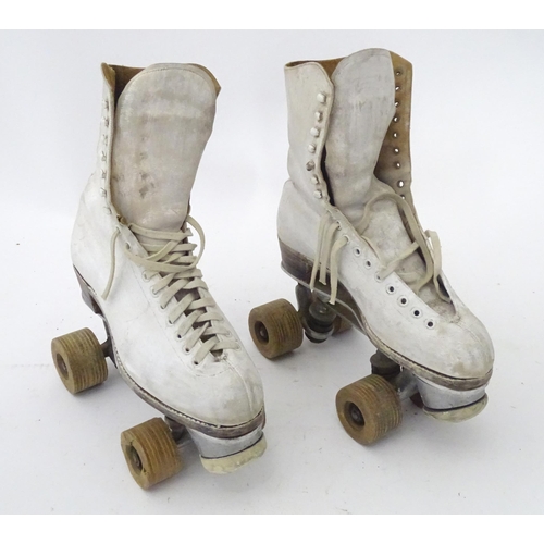 17 - A pair of mid 20thC roller skates, maker under Ace 6