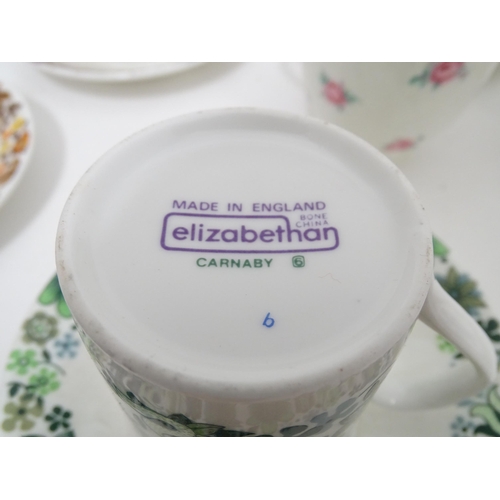 21 - A quantity of assorted mid century / retro ceramics including Elizabethan China Carnaby tea cups and... 