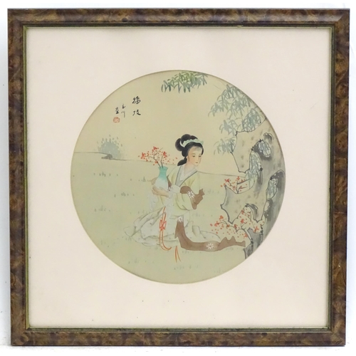 49 - Japanese School, Watercolour on silk, A garden scene with a young lady holding a vase. Character mar... 