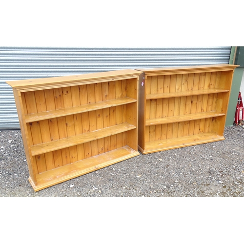 1 - Two 20thC three tier pine bookcases. Each approx. 52