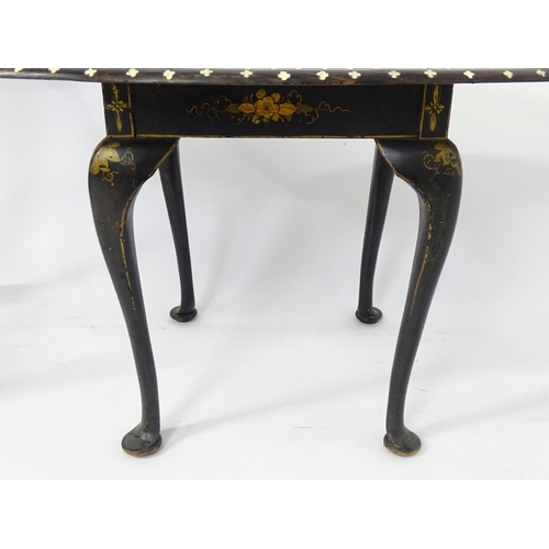 41 - An early 20thC Indian occasional table the oval top with inlaid decoration. Together with an early 2... 