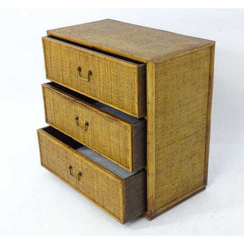 46 - A mid 20thC chest of drawers with bamboo and rattan detail. Approx. 30