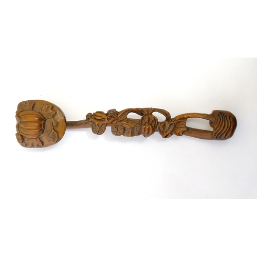 1244 - A Chinese carved boxwood ruyi sceptre with fruiting vine detail. Approx. 11