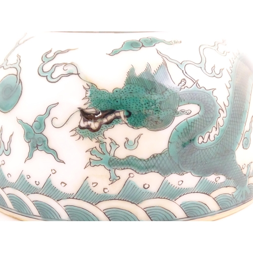 29 - A Chinese brush wash pot of dome form decorated with dragons amongst stylised clouds. Character mark... 