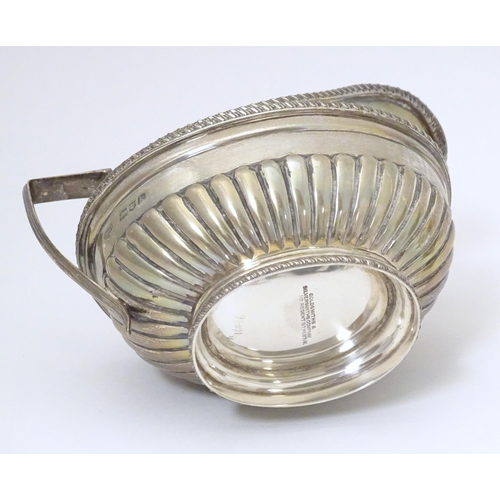 316 - A silver sugar bowl and cream jug hallmarked London 1905, maker Goldsmiths & Silversmiths Company Lt... 