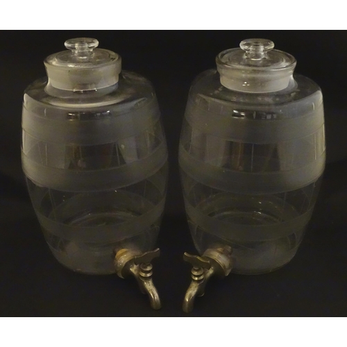 258 - Two Victorian glass spirit / rum  barrels with etched decoration and with silver plated taps. Approx... 