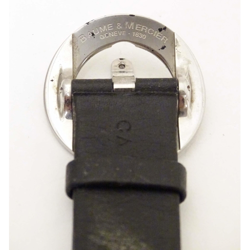 769 - A Baume & Mercier Vice Versa quartz wrist watch, the case signed and numbered having a black leather... 