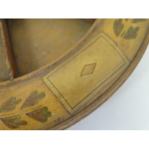 1389 - Toy: An early 19thC turned boxwood skating board / games wheel for the card game Pope Joan with cent... 
