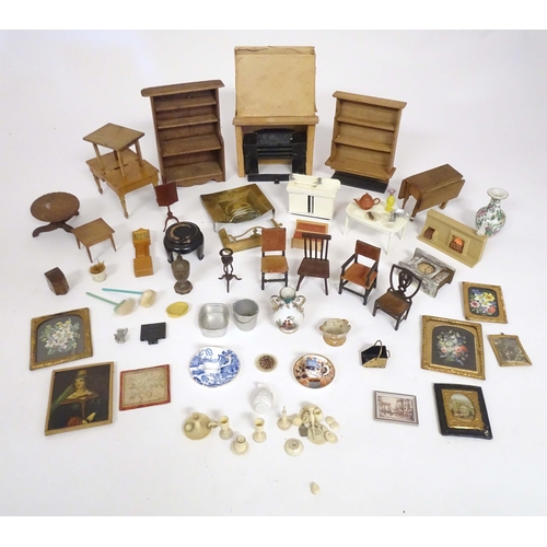 1391 - Toys: A quantity of assorted 19thC and later dolls house furniture and household items to include dr... 