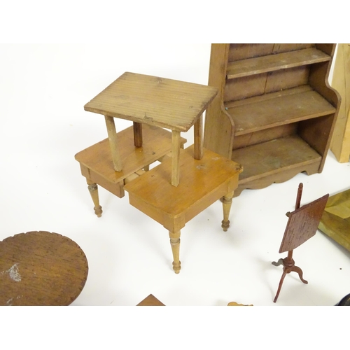 1391 - Toys: A quantity of assorted 19thC and later dolls house furniture and household items to include dr... 
