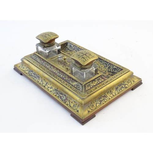 1246 - A Victorian Boulle work desk stand / ink standish, the twin square sectioned inkwells flanking a cen... 