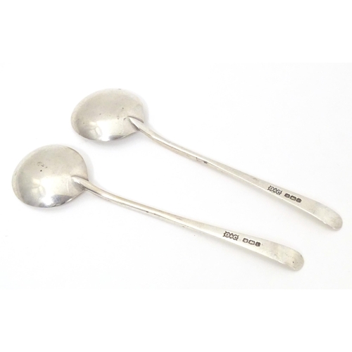 360A - Two Art Deco silver preserve / jam spoons hallmarked Sheffield 1923, maker G & C. Approx. 5 1/4