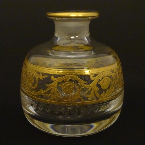 161 - St Louis Glass : A Saint Louis Thistle perfume / scent bottle and stopper, with banded gilt decorati... 