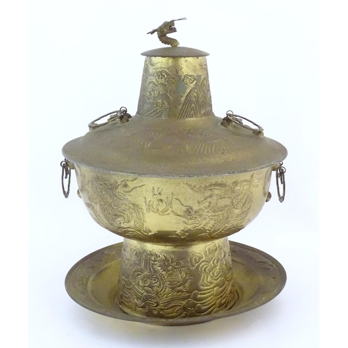 786 - A Chinese cast metal twin handled warming / steaming pot comprising, stand, burner section, bowl, ch... 