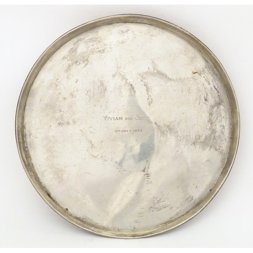 245 - A Victorian silver salver / tray of circular form standing on three squat bun feet, hallmarked Sheff... 