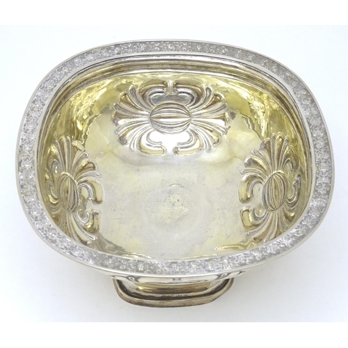 361 - A Russian silver pedestal bowl with embossed floral motifs and foliate border to rim. Marked under. ... 