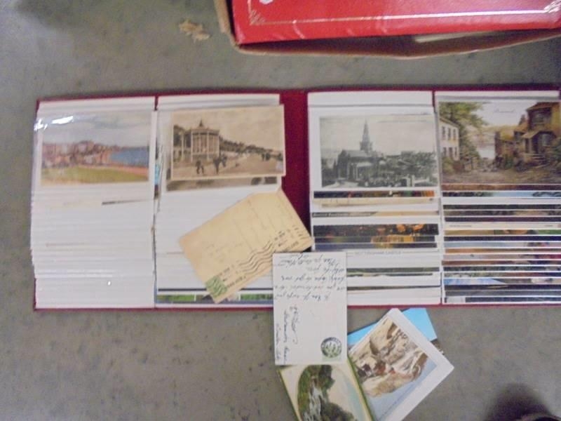 2 folders of old postcards, various era's, mainly modern topographical.