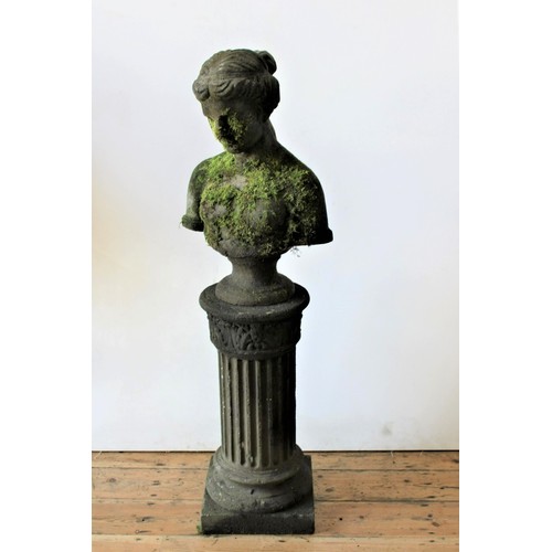 A WEATHERED RECONSTITUTED STONE BUST OF GREEK MAIDEN ON CORINTHIAN COLUMN, the column splits into three sections, total height 137cm